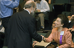 John F. McDonnell, vice chairman of the Board of Trustees, shakes hands with Khunying Suchada Kiranandana, president of Chulalongkorn University, prior to the Presidents Forum May 5.