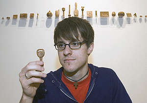 A creative need led Mark Bartholomew from medicine to art. He transforms everyday objects, such as keys, into artworks by making molds from them and casting them into ceramic forms. His work reflects his view of giving purpose to each experience, something he hopes to share through teaching.