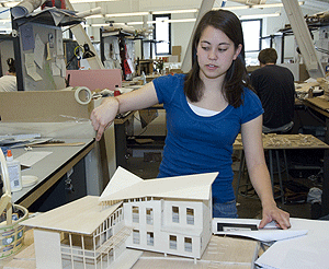 Carolyn Wong creates architectural models of her design for the Hoffman Triangle, a New Orleans neighborhood devastated by Hurricane Katrina. The Ohio native helped devise a plan that would allow the area to supply its own energy and water, with housing constructed using recyclable materials.