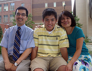 (From left) Dennis, Kenneth and Reina Armamento-Villareal on the School of Medicine campus.