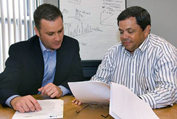 Office for Technology Management co-directors Michael T. Marrah, JD, assistant vice chancellor and associate general counsel, left, and Bradley J. Castanho, PhD, assistant vice chancellor, work together to oversee the legal and business considerations inv