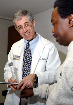 David Clifford with patient Sylvester Murris