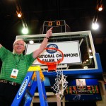 John Schael, former director of athletics, getting the game net after the Bears win the national championship in Salem, VA.