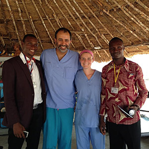 Shown is the leadership team at an Ebola treatment unit (ETU) in Port Loko, Sierra Leone, in 2015. From the left: Usman Koroma, Indi Trehan, MD, Cecilia Rose English and Francis Gaima. Usman and Francis headed the Sierra Leonean clinical team; Trehan, of Washington University, and English led the ETU and the Partners In Health team.