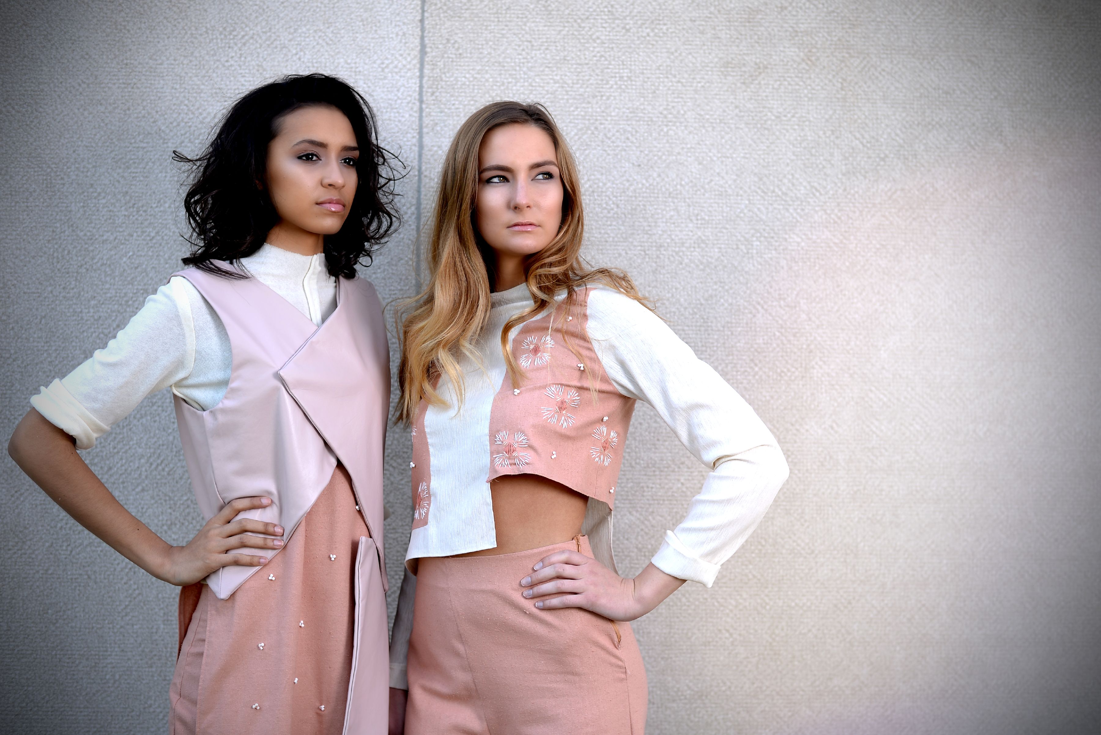 Sheridan Young (left) and Maggie Hennessey of Centro Models wear designs by senior Priyanka Reddy. (Photo: James Byard/Washington University)