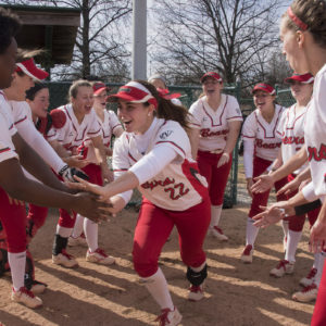 Junior outfielder Janet Taylor gets a pregame handshake from her teammates before a softball game at home against Illinois Wesleyan March 29, 2016.