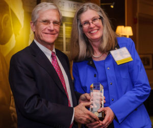 Patrice Delafontaine, MD, dean of the University of Missouri School of Medicine, presents Victoria J. Fraser, MD, head of the Department of Medicine at Washington University, with the Citation of Merit from the University of Missouri. (Photo: University of Missouri)