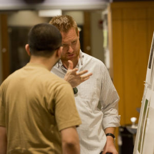 Andreas Windisch, creator of the moonscape above, at the opening of Research as Art. (Photo: Danny Resie/WUSTL Photos)