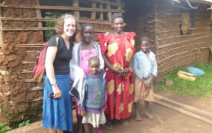 Colleen Walsh Lang with children and women in Uganda