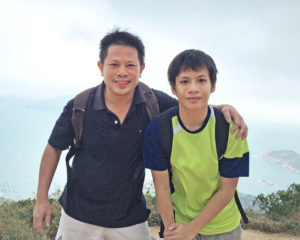 Business leader Thomas Cheong with his son