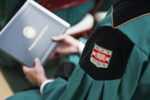 Commencement robe and diploma