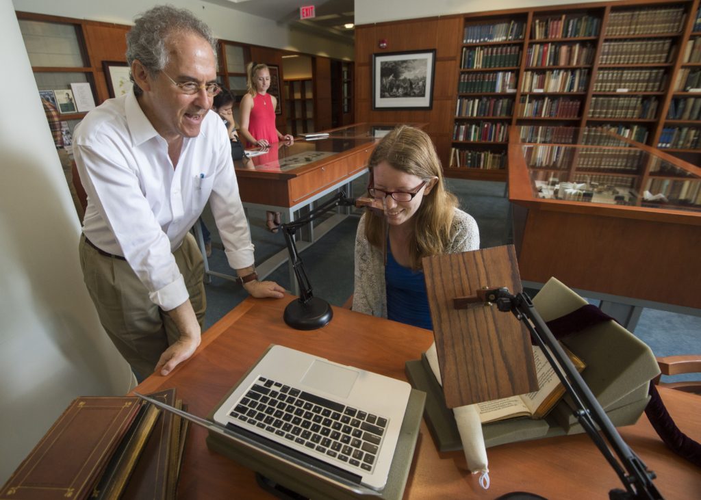 Joe Lowenstein works with recent graduate Keegan Hughes, one of several students who helped correct errors in the Early English Books Online archive. (Photos: Joe Angeles/Washington University)