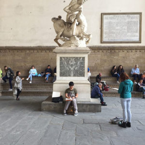 students sketching in Italy