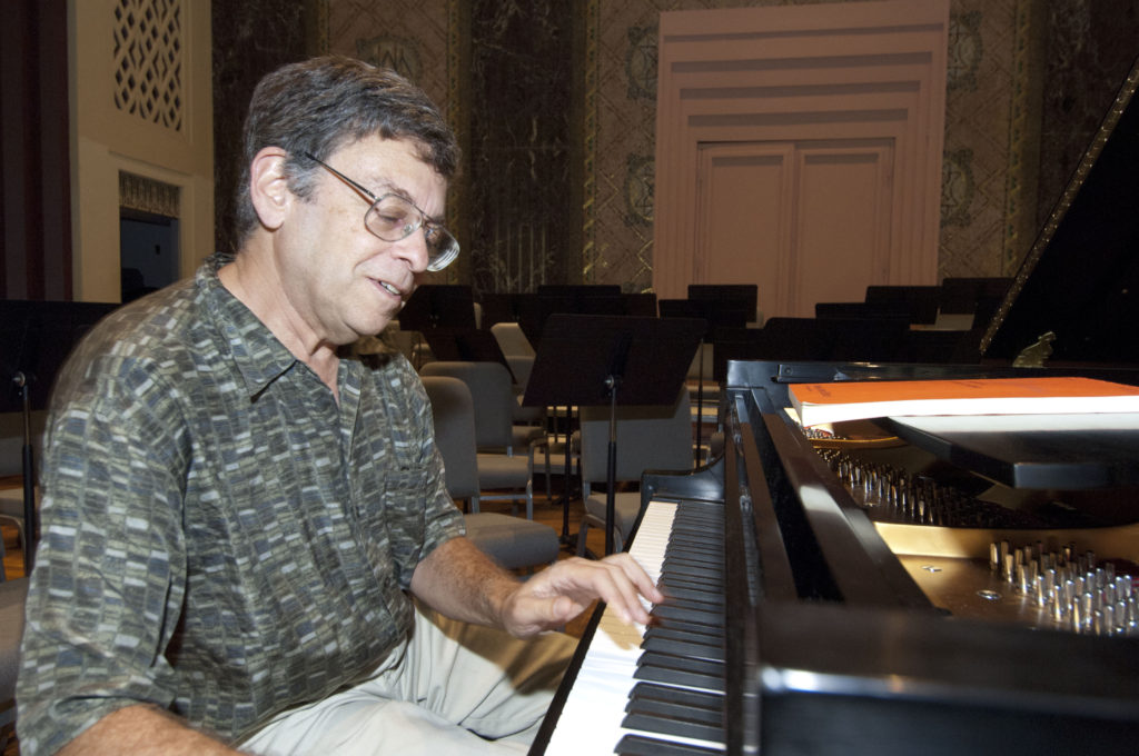 Carlin rehearses in the E. Desmond Lee Concert Hall in 2004.