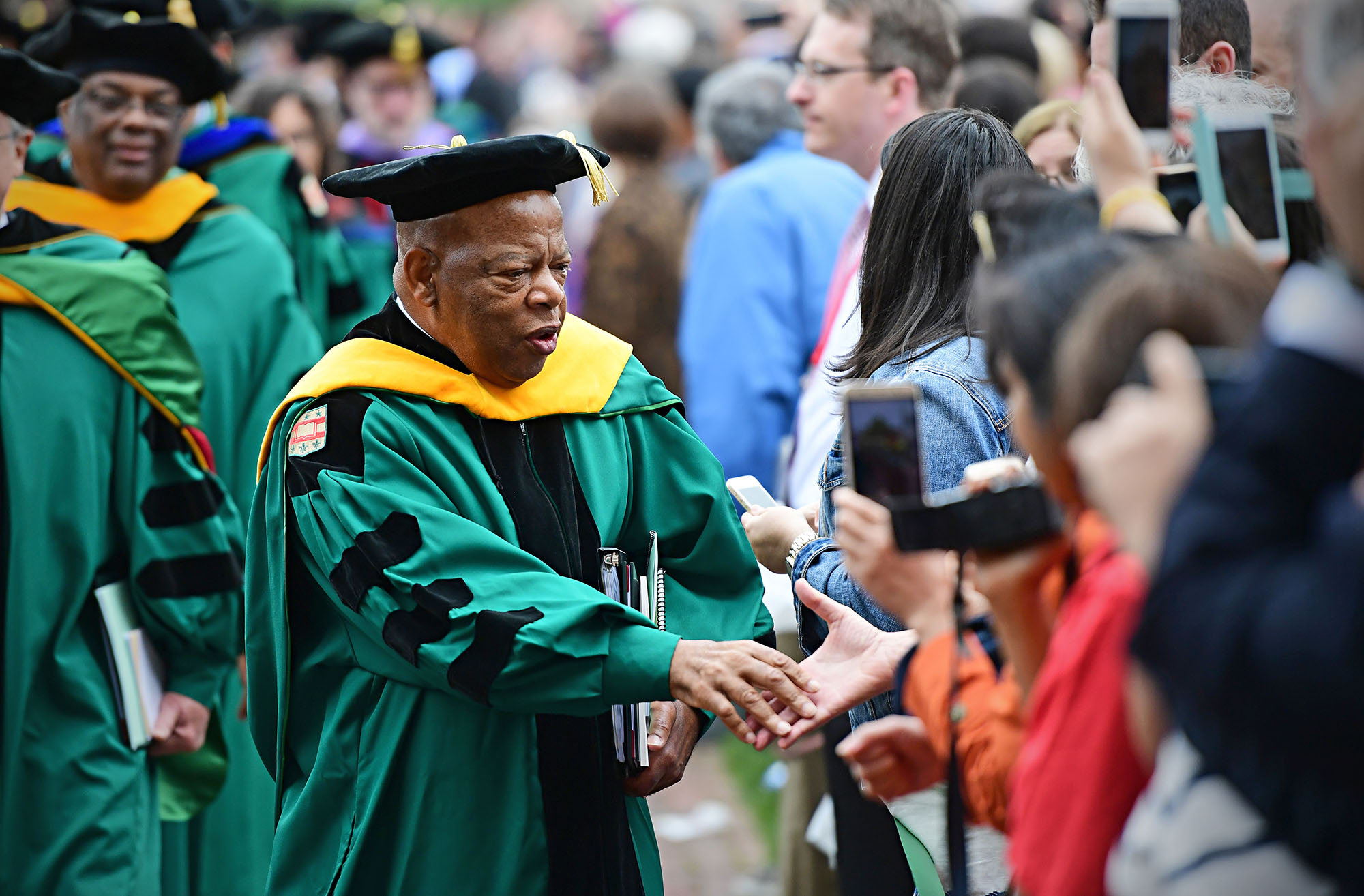 Members of the Washington University in St. Louis Class of 2016 joined family, friends and other members of the university family for the university's 155th Commencement Ceremony in the Brookings Quadrangle Friday, May 20, 2016. Rep. John Lewis (D-Ga.) served as Commencement speaker. (Photo: James Byard/Washington University Photos)