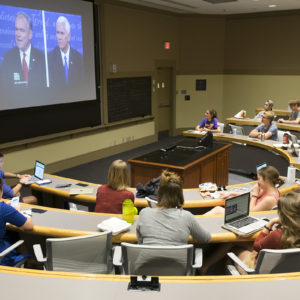 students watch debate