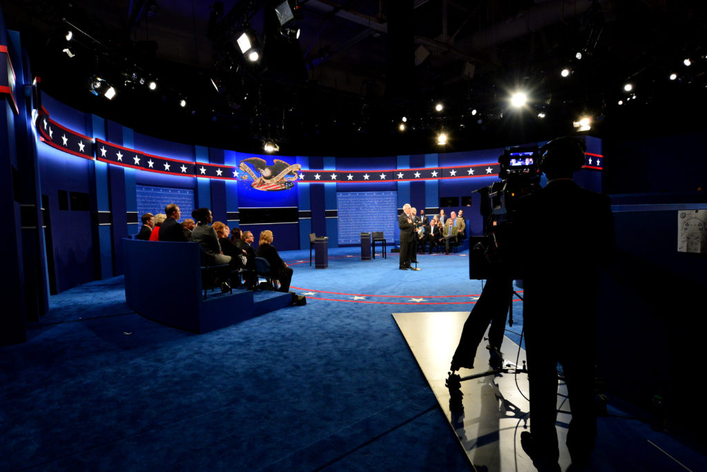 Moments before the candidates appear, members of the Commission on Presidential Debates address participants of the town hall at Washington University in St. Louis. (Photo: Joe Angeles/Washington University)