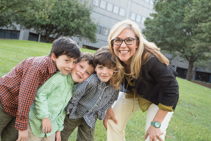 Emily Jungheim with three sons of her patient