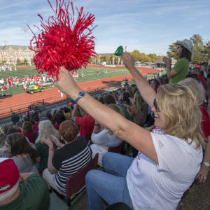 parents cheer for football game