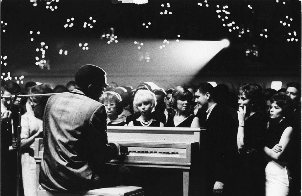 Ray Charles plays piano