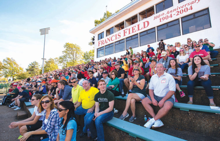 Alumni, students, parents and friends watch the football Bears square off against the Case Western Reserve University Spartans during Fall Festival. (Joe Angeles/Washington University)
