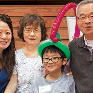 From left: Susan Yang, MD ’97; Su Ling Yang; Nathan Wang; and Chia Yang, MA ’67, PhD ’71, attend the 2016 Fall Festival. (Sid Hastings/Washington University)