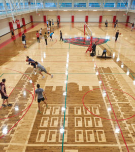 The new three-court gym will host 30 intramural sports and some 550 IM games this year. Sports range from favorites like basketball and flag football to untraditional games like bubble soccer and log rolling. (Dan Donovan/Washington University)