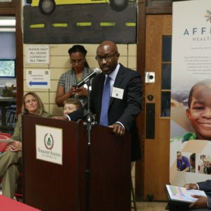 Jason Purnell speaks at health clinic opening