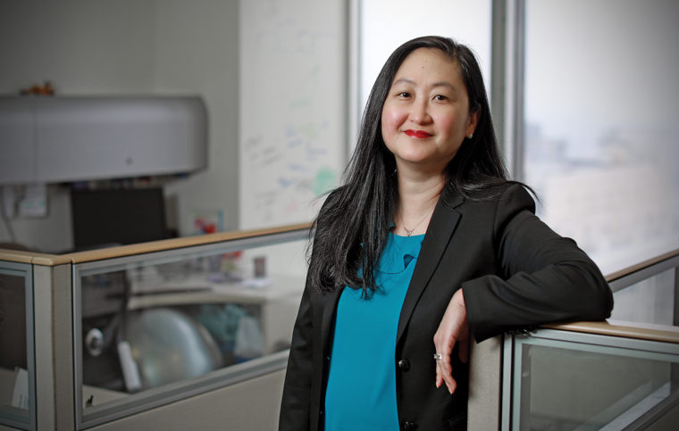 Esther Shin in the Urban Strategies, Inc. offices