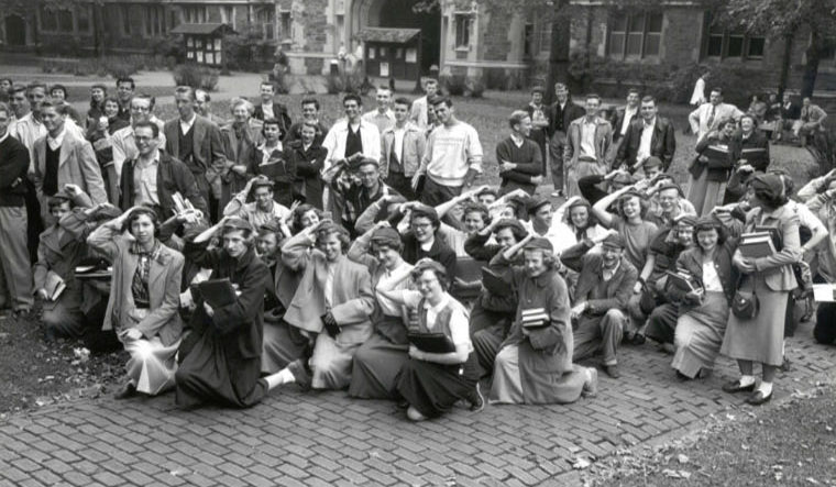 Freshmen on campus in beanies