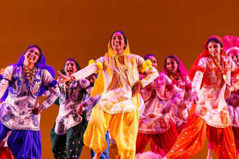 Students performing South Asian dance