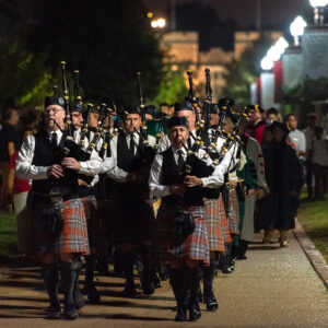 bagpipers play on campus