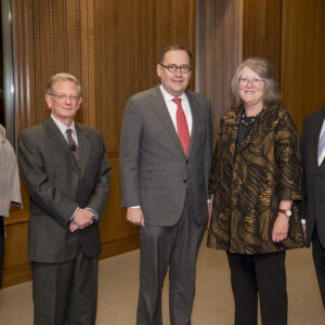 Interim Provost Marion G. Crain (left) and Chancellor Andrew D. Martin (center) recognized faculty award recipients (from left) Yoram Rudy, Fiona Marshall and Gary Stormo during a Nov. 8 ceremony in Emerson Auditorium.