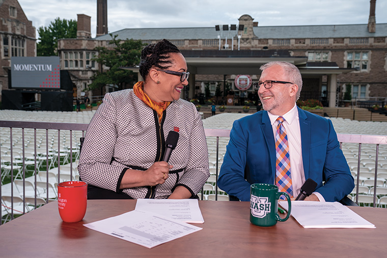 During a live pre-ceremony show, Adrienne D. Davis (left), vice provost and the William M. Van Cleve Professor of Law; and Todd Decker, the Paul Tietjens Professor of Music and chair of the Department of Music in Arts & Sciences, interviewed dignitaries and special guests on the significance of the day.