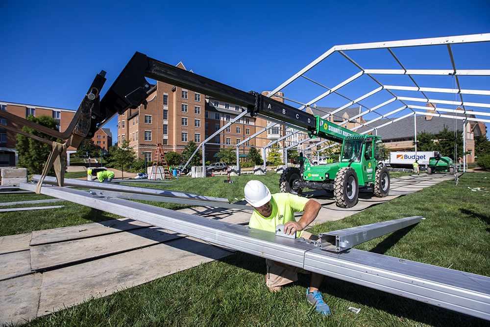 A tent is being erected on the South 40’s Swamp, one of the new planned environments where students can study and spread out at a safe distance. (Photo: Joe Angeles/Washington University)