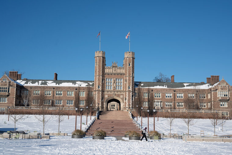 snow surrounds Brookings Hall