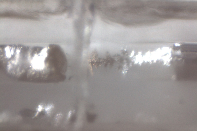 Snapshot of sodium (Na) penetrating a layer of the separator in a sodium metal anode.