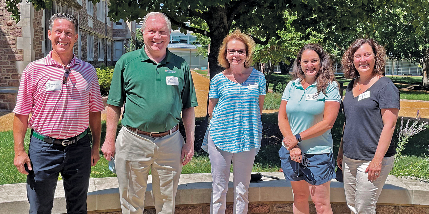 ABG members Kirk Wrobley, MBA ’91; Vince Belusko, BS ’78; Susan O. Warshaw, MSW ’79; Jamie Fleischner, AB ’95; and Lisa Perlmutter, AB ’93, BSOT ’97, were on campus for fall 2021 Move-In Day. Fleischner and Perlmutter are both parents of  students in the Class of 2025 who moved into their first-year dorms that day. (Courtesy photo)