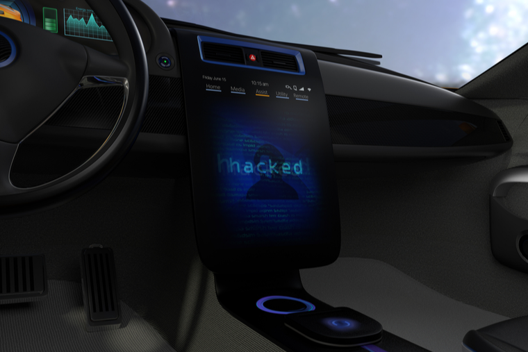 Image of car infotainment screen displaying the word,"hackd"