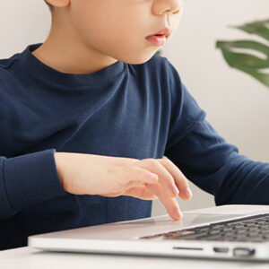 image of child on laptop