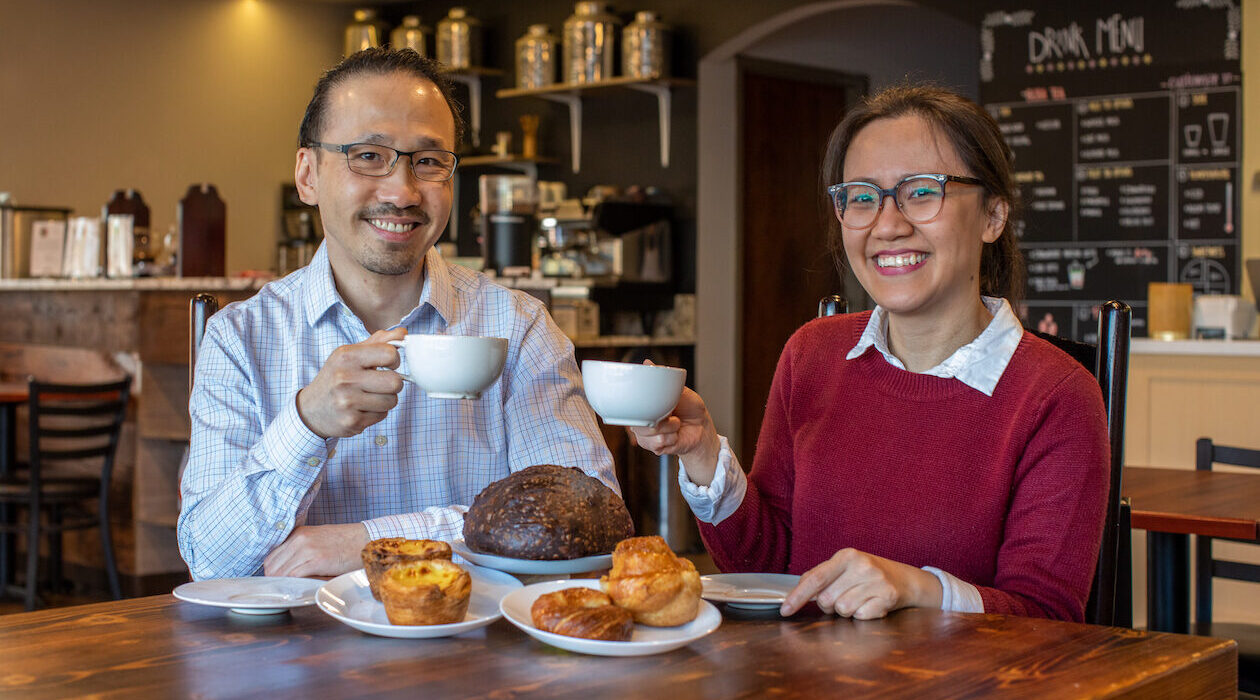 Ray Yeh and Leah Yeh pose with coffee and pastries
