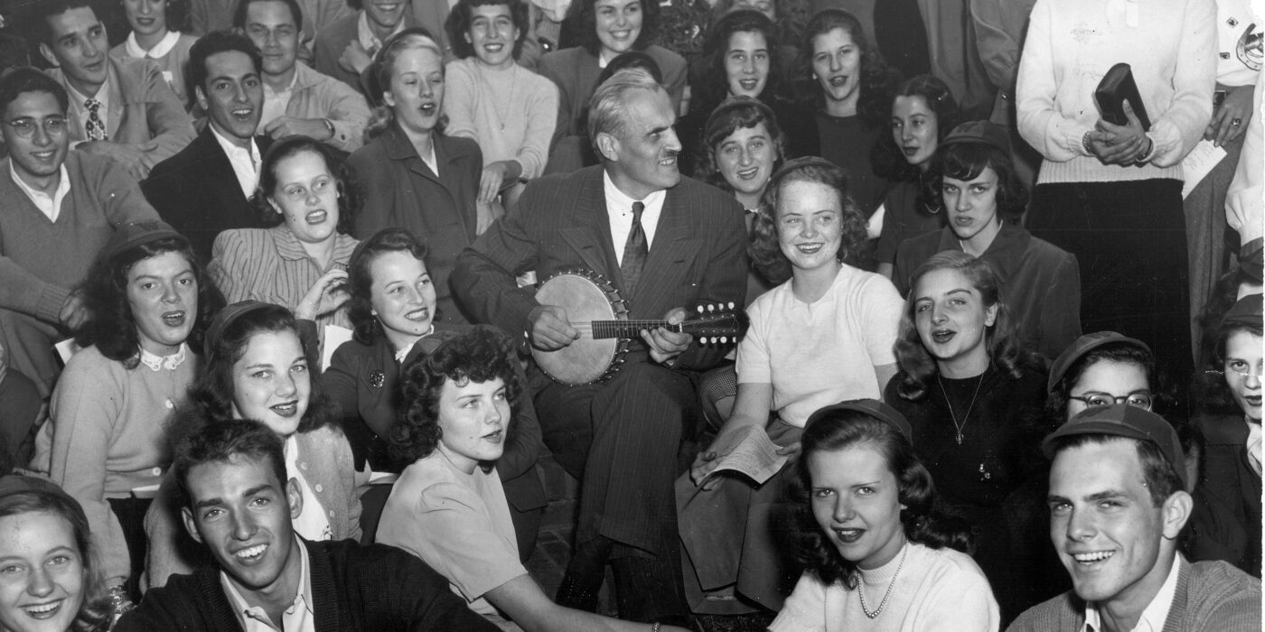 Arthur Holly Compton (playing banjo) was Washington University’s ninth chancellor, serving from 1945-53. Previously a professor and head of the physics department, Compton conducted X-ray scattering experiments in 1922 that demonstrated the particle nature of electromagnetic radiation. At the time, the idea that light had both wave and particle properties was not easily accepted. (Washington University Archives)