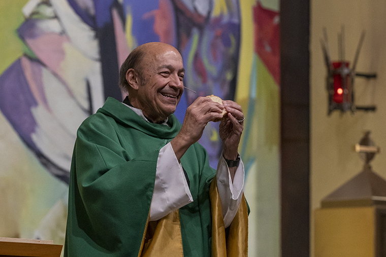 Father Gary celebrates mass on his 72nd birthday, near the Danforth Campus of Washington University in St. Louis.