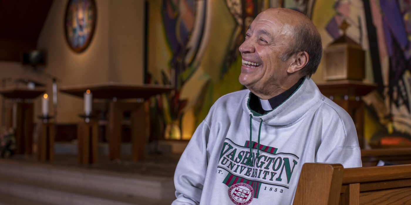 Fr. Gary Braun in the chapel of the Catholic Student Center on Forsyth Avenue, in his favorite sweatshirt.