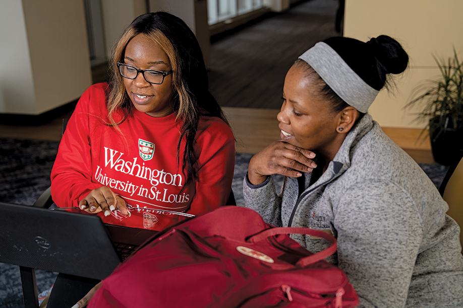 De’Ona Hardy (left) and Erica Jenkins, both from Illinois, are certified medical assistants at the School of Medicine who graduated with associate’s degrees from ­Washington University in May through the pre-nursing program. (Photo: Whitney Curtis/Washington University)