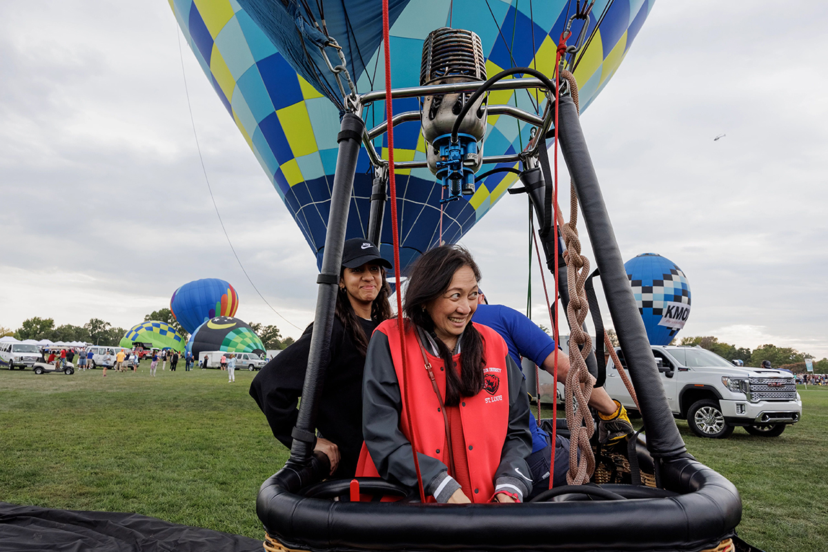 WashU student Anusuiya Mehrotra, winner of the balloon race contest, and Anna Gonzalez, vice chancellor for student affairs