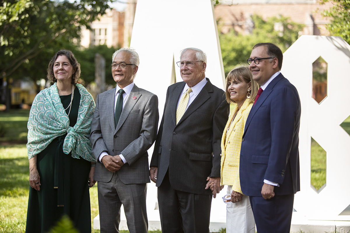 Provost Beverly Wendland, Feng Sheng Hu, Richard G. “Dick” Engelsmann, Diane Buhr Engelsmann and Chancellor Andrew D. Martin on the Olin Library lawn.