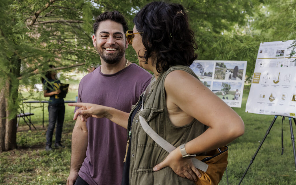 Matthew Bernstine (left), MUD ’14, associate director of the Office for Socially Engaged Practice, attends a groundbreaking event for Peace Park in the College Hill neighborhood last summer. (Photo: Whitney Curtis/Washington University)