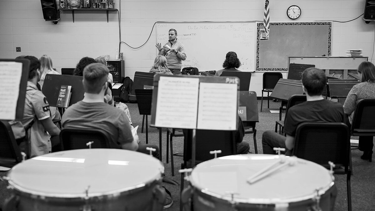 Dacoda Scarlet speaks to Palmyra High School students in the school band room