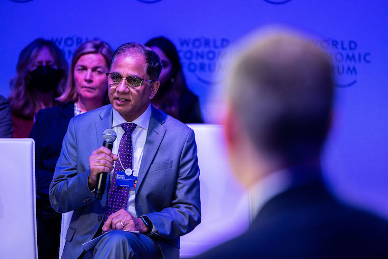 Shyam Bishen, PMBA '99, speaks during the "Health Systems: Building through Disruption" session at the 2023 World Economic Forum annual meeting in Davos, Switzerland. (Photo: World Economic Forum/Ciaran McCrickard)